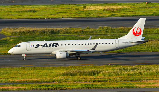 Tokyo, Japan - Nov 2, 2019. JA251J J-Air Embraer ERJ-190STD taxiing on runway of Tokyo Haneda Airport (HND). Haneda handled 87,098,683 passengers in 2018.