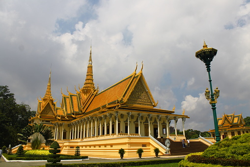 Royal Palace in the city of Phnom Penh in Cambodia with a cloudy sky. Magnificent King's Palace