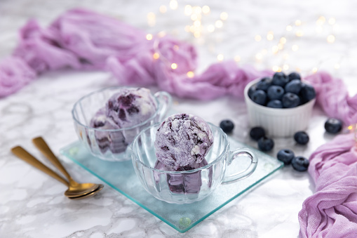 Blueberry ice cream with festive lights