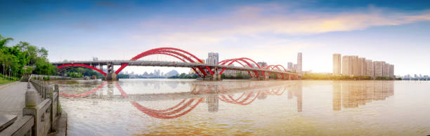 Orange bridge river city skyline, Liuzhou, China. stock photo