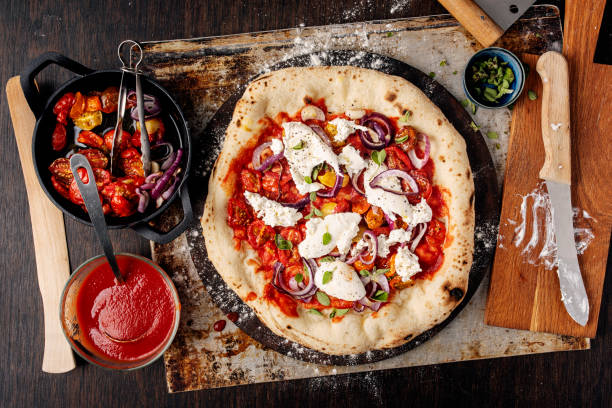 istock Red Onion and Tomato Pizza with Burrata 1500523496