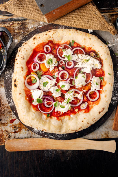 istock Red Onion and Tomato Pizza with Burrata 1500523518