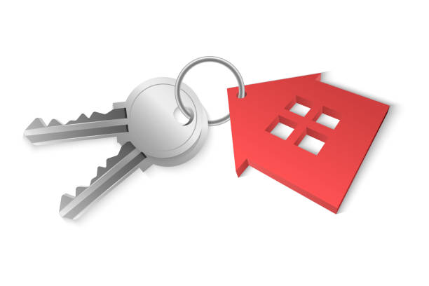 istock 3D vector image of a realistic silver house keys with key chains in the shape of a red house, isolated on a white background 1500523531
