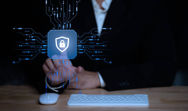 istock Businessman touch virtual screen on computer,Cyber secutiry concept,A shield protects the laptop from virus from the internet. 1500524387