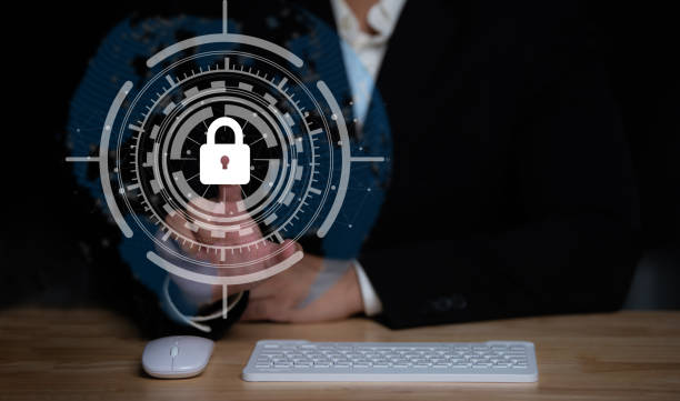 istock Businessman touch virtual screen on computer,Cyber secutiry concept,A shield protects the laptop from virus from the internet. 1500524397