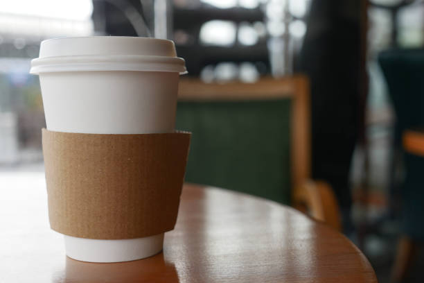 istock take away paper coffee cup o on cafe table 1500527339