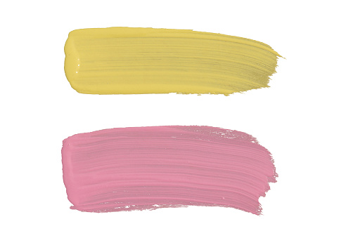 Yellow pink brush strokes on white background