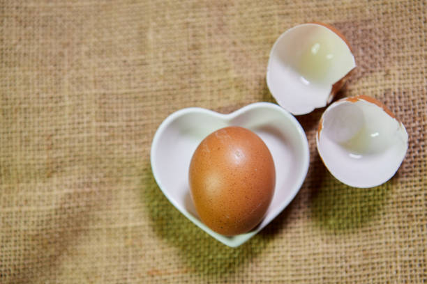 istock Close-up of raw eggs in the bowl 1500528542