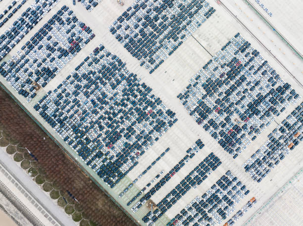 Aerial view of new cars lined up in the port for import and export Large number of cars at parking lot,waiting for export at Shanghai port. Grid-Scale Battery Storage Technologies stock pictures, royalty-free photos & images