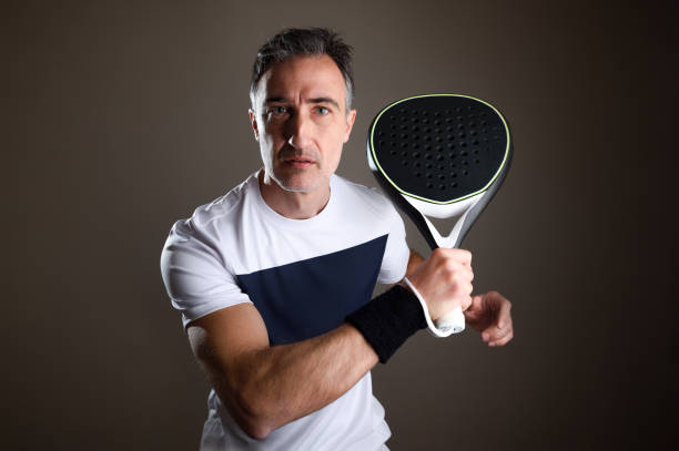 istock Padel player portrait with isolated dark background 1500538261