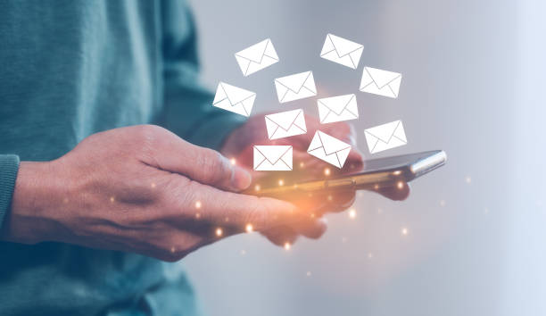 istock email and document concept, businessman  using mobile smart phone reviewing reading sending email to clients, business promotion, online document, social distancing practice, online communication 1500539119