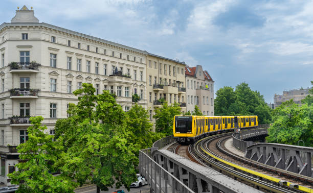 istock Berlin subway on viaduct against building 1500540104