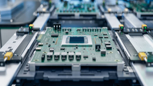 istock Close-up of Circuit Board with Advanced Microchip. Electronic Devices Production Industry. Fully Automated PCB Assembly Line. Electronics Manufacturing Facility or Factory. 1500558444