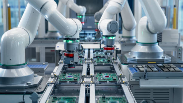 istock Fully Automated Modern PCB Assembly Line Equipped with Advanced High Precision Robot Arms at Bright Electronics Factory. Component Installation on Circuit Board. Electronic Devices Production Industry 1500558466