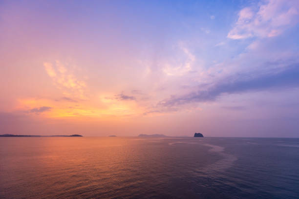 istock Sunset sky with sea and island background 1500562717