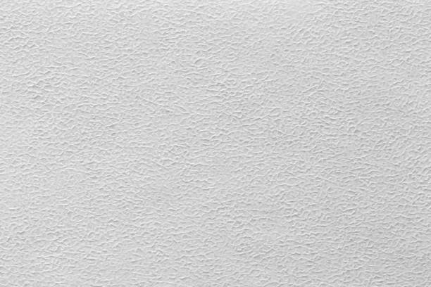 istock White color eco recycled kraft paper sheet texture cardboard background. 1500565591