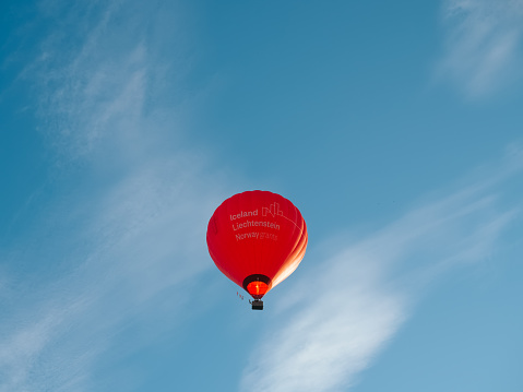 Vilnius, Lithuania - 06 13 2023: Hot air balloons in Vilnius. Bright hot air balloon in the sky