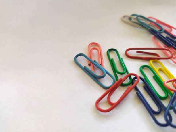 istock color paperclip taken from close to white background 1500568043
