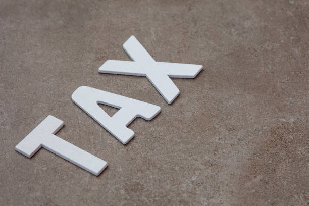 istock tax written in wooden letters 1500568467