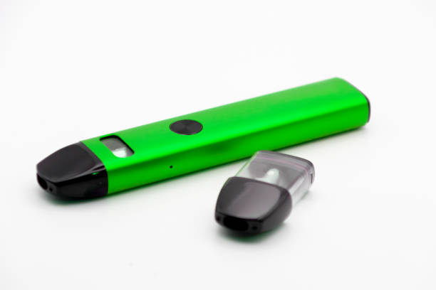 istock Green Electronic Cigarette Pen isolated on white with pod 1500571020