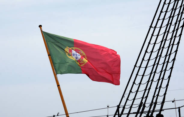 istock Portuguese flag waving in the wind on a ship 1500571356