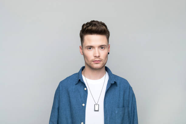 istock Portrait of confident young man 1500573392