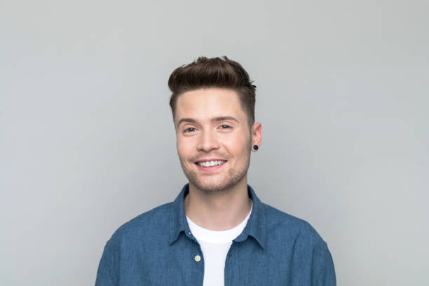 istock Portrait of smiling young man 1500574253