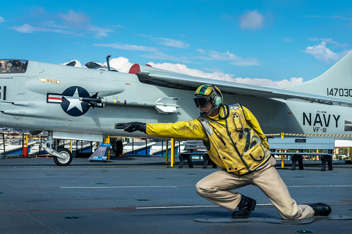 Aircarft carrier officer on the flight deck of the USS Midway, San Diego, California