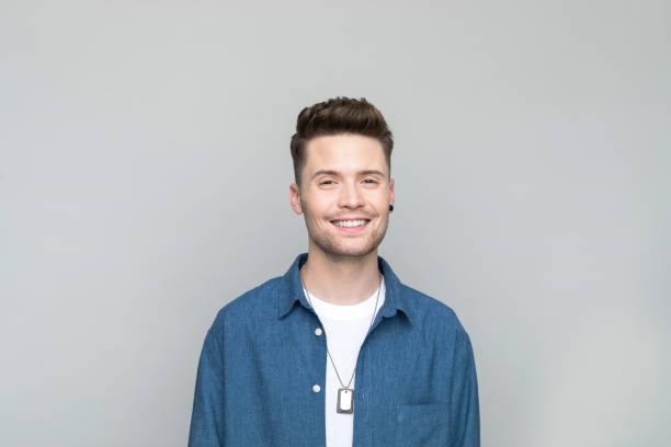 istock Portrait of smiling young man 1500574569