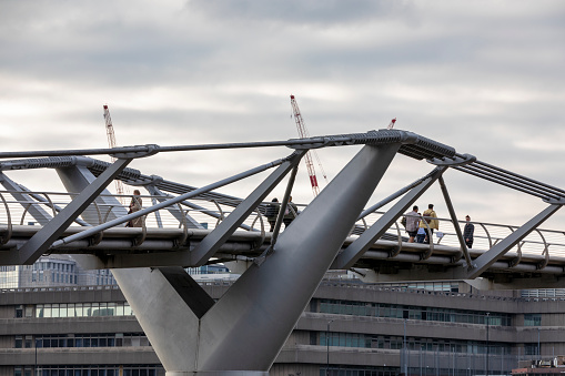 Tower cranes at new high rise apartment development during construction UK