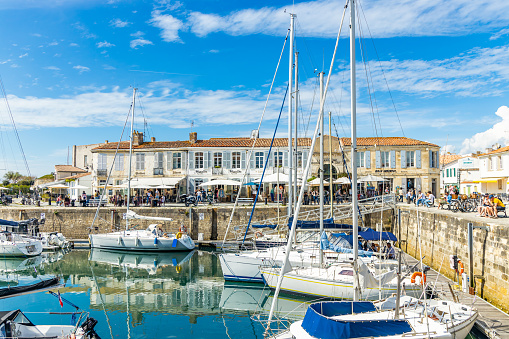 Boats and quays of the old port of Saint-Martin-de-Ré, France