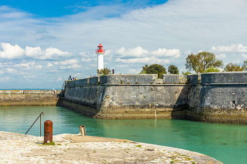 Lighthouse and dike at the port of Saint-Martin-de-Ré, France