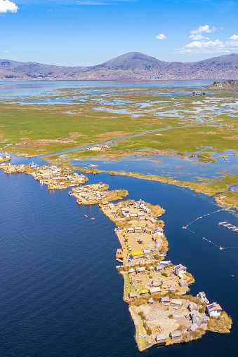 Uros Islands, Lake Titicaca, Peru: The floating islands of Uros are located in Lake Titicaca, the world's highest navigable lake, close to Puno at 3.812 metres above sea level. These floating islands are made out of reed which is an aquatic plant that grows on the surface of the Lake Titicaca.