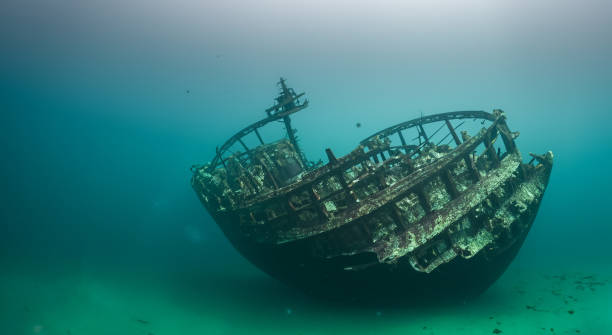istock ancient sunken ship under the deep sea with good lighting HD 1500597331