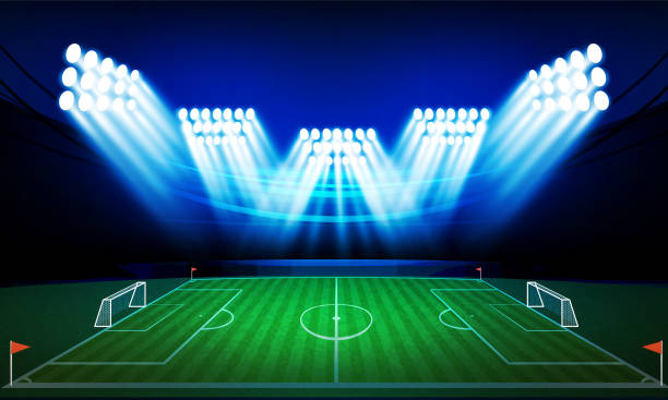 istock Football arena field with bright stadium lights vector design. 1500599180