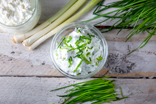 Fresh curd and herbs - dairy product. Quark. Fruehlingsquark