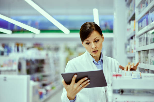istock A busy female pharmacist doing an inventory and looking at the tablet. 1500601144
