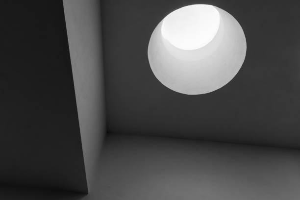 Abstract minimal interior with round skylight portal, black and white architecture background photo
