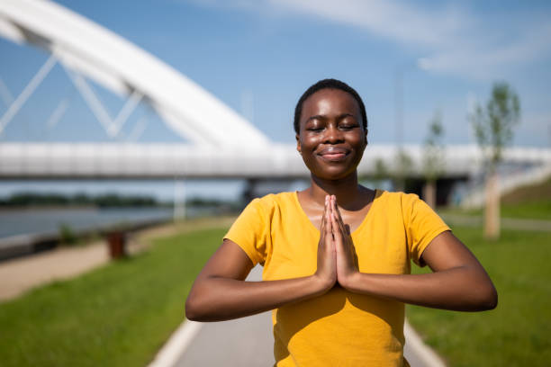 istock Woman  meditating outdoor 1500602564