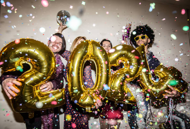 istock A group of people dancing with gold foil 2024 1500602824