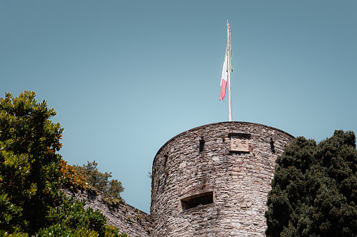 The Rocca di Bergamo. Italian flag on the tower