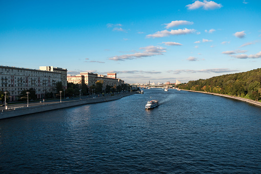 View of the Moskva River and the sightseeing boat on it