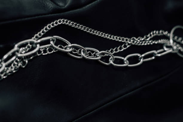 istock Chain on black texture eco soft leather, fashionable jacket 1500614076