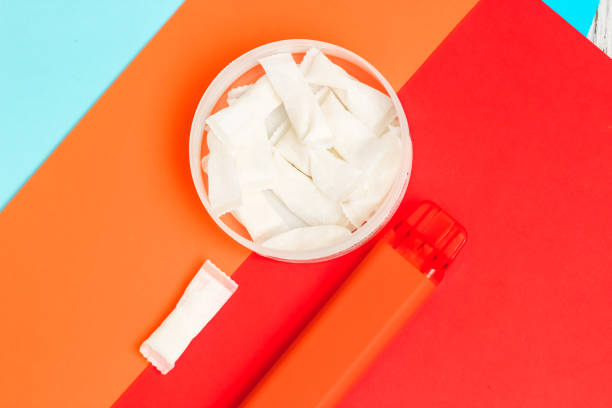 istock Nicotine pads snus, cigarette replacement, together with an electronic cigarette 1500615441