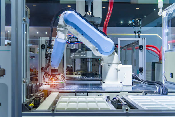 istock Automatic industrial robotic robot working, industry 4.0 and technology concept 1500615761