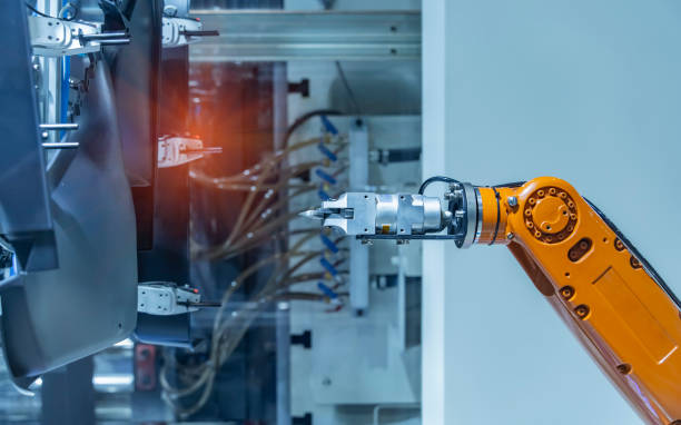 istock Automatic industrial robotic robot working, industry 4.0 and technology concept 1500616311