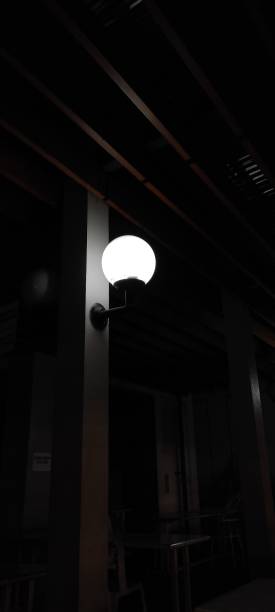 istock Light bulbs glow in the garden at night 1500617017