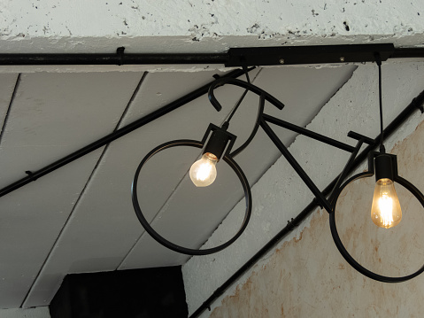 bicycle pendant lamp, designed in a round loft style, is a unique and eye-catching lighting fixture that adds a touch of industrial charm to any space. Inspired by vintage bicycles, this pendant lamp.