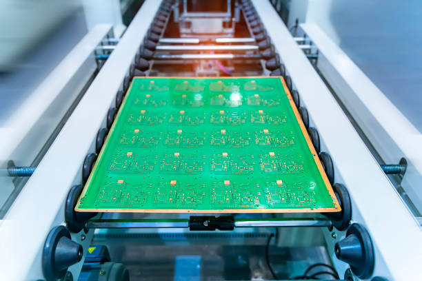 istock automatic robot for print circuit board (PCB)assembly machine during soldering or welding part 1500619157