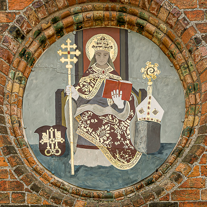 painting of Pope Lucius I on the brick wall of Roskilde cathedral, Roskilde, Denmark, June 15, 2023